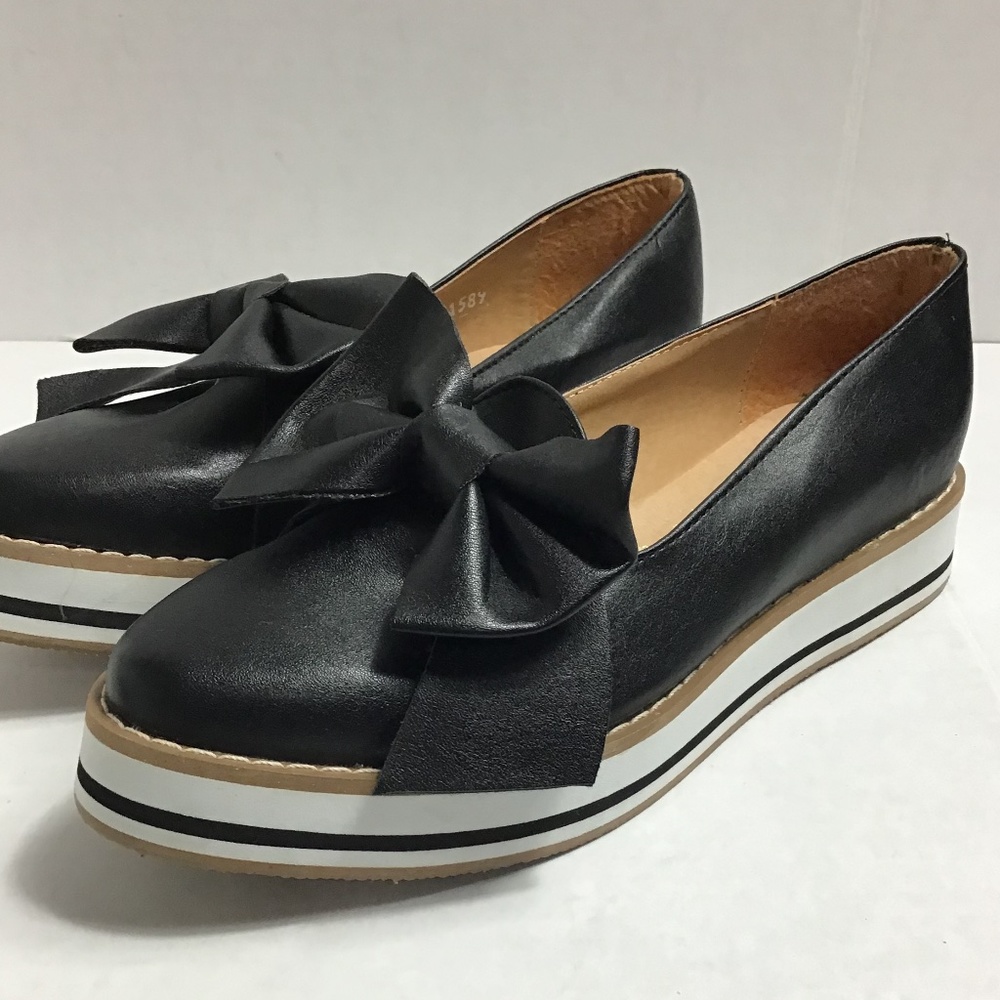 Selah Bow Slip on Sneaker Black Faux Leather